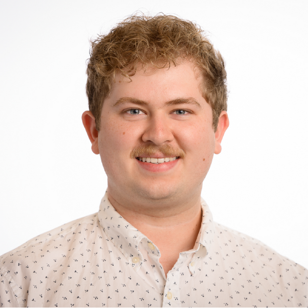 Portrait photo of Simon Dimock