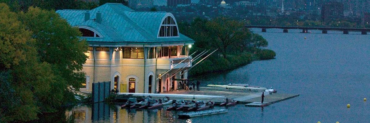 The BU boathouse in summer at dusk