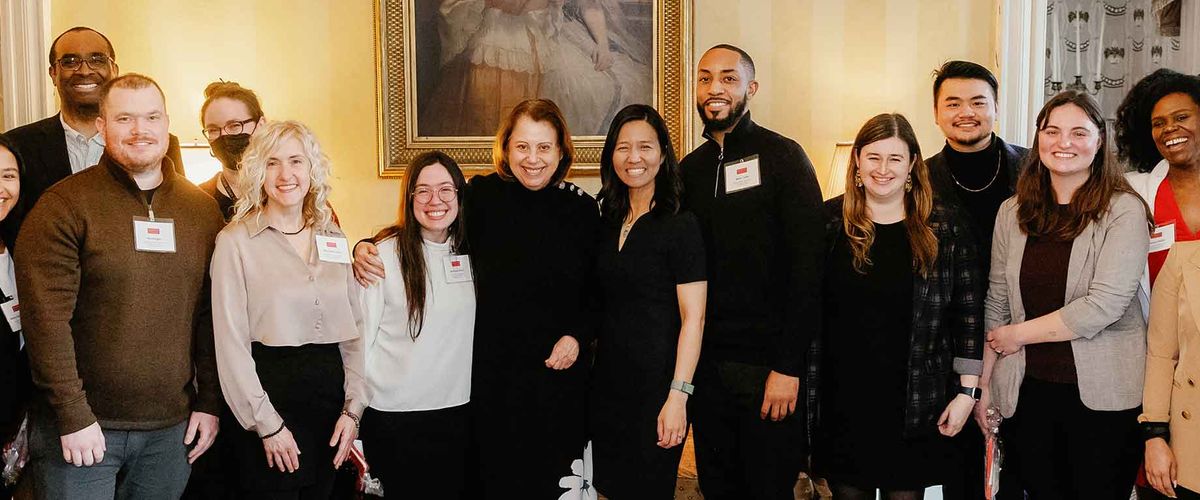 Boston Mayor Michelle Wu and MET Dean Tanya Zlateva pose with students recognized at the 13th Annual City of Boston Scholar Recognition Event