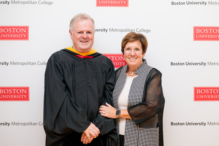 Michael McCabe (MET’87,’87) poses at the MET Marketing commencement photo booth