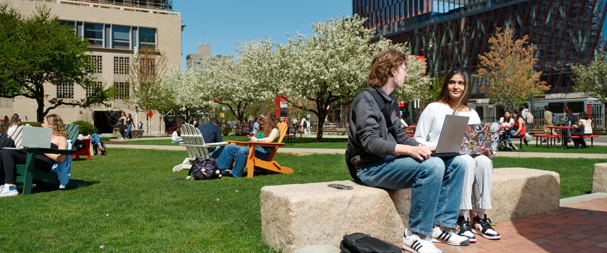 Graduate students in various locations on the Boston University campus