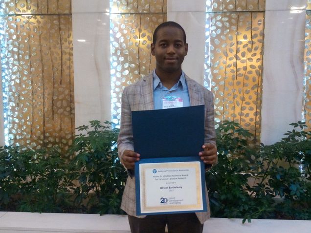 Ollie with McMillen PD certificate, APA 8-17 (1)