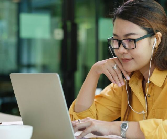 Woman studying on a laptop
