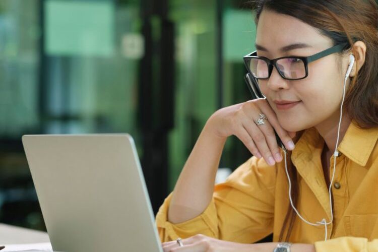Woman studying on a laptop