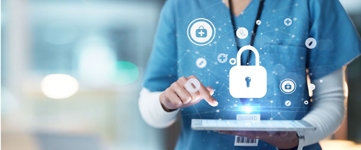 stock image of headless medical professional in blue from the waist up tapping on a tablet as medical symbols float around her, including a giant lock right above the tablet