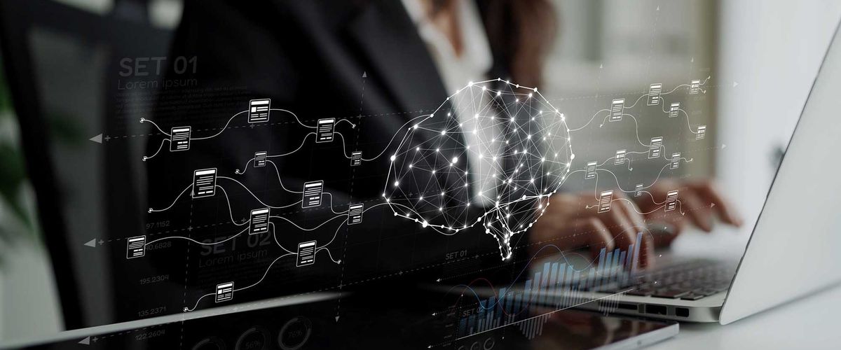 A woman typing on a laptop with an overlay of digital folders and files strung together showing connectivity.