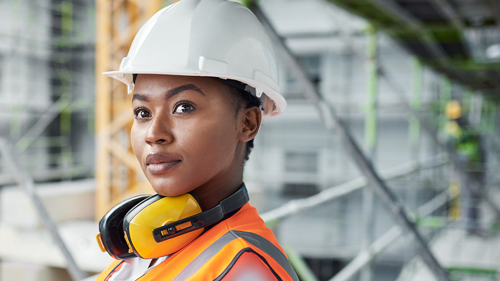 A construction manager surveying a construction site