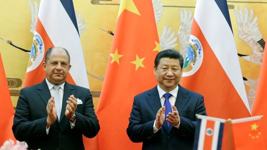 Costa Rica's President Luis Guillermo Solisi Meets China's Xi Jinping