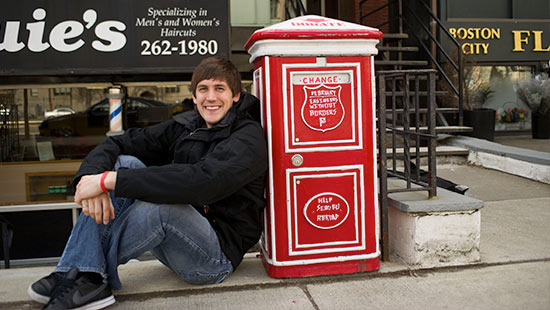 Project Mailbox founder Nick Dougherty  ENG ‘12 is with his donation box he recycled from an antique dealer. Project Mailbox is a charity for other charities, raising awareness and money for different causes one coin at a time. Each month, we raise money for a charity YOU vote for, alternating between local, national and international causes.  Photo by Kalman Zabarsky