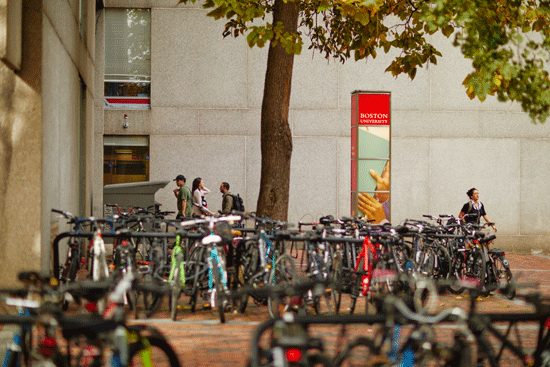 Bikes parked at bike racks in front of the George Sherman Union.
