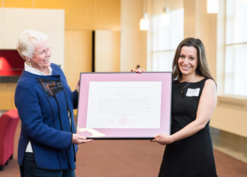 School of Education Professor Amie Grills (right) receives the 2017 United Methodist Scholar/Teacher of the Year Award from University Provost Jean Morrison at the annual Celebration of Teaching, Research & Scholarship on April 28. (Photo by Jackie Ricciardi for Boston University Photography)