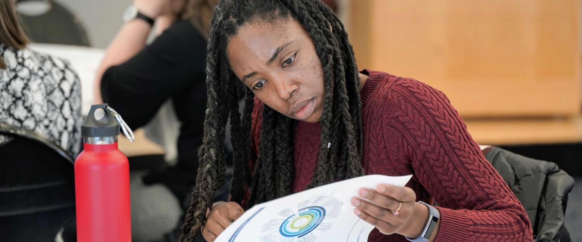 Postdoc reviewing orientation packet