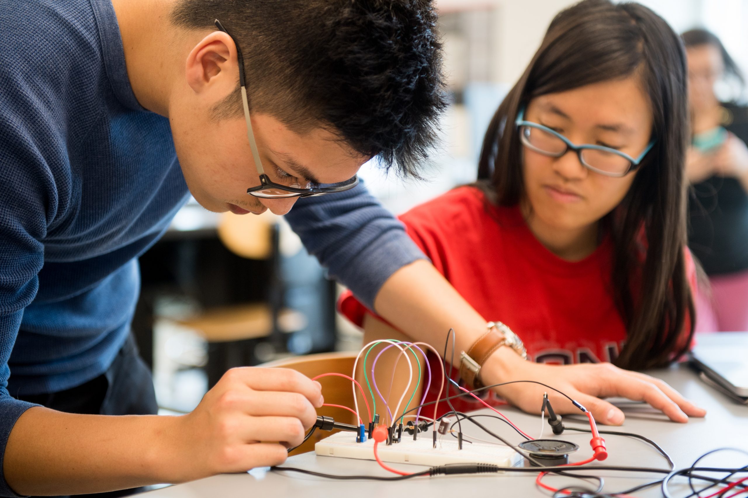 Lab assistant working on circuits