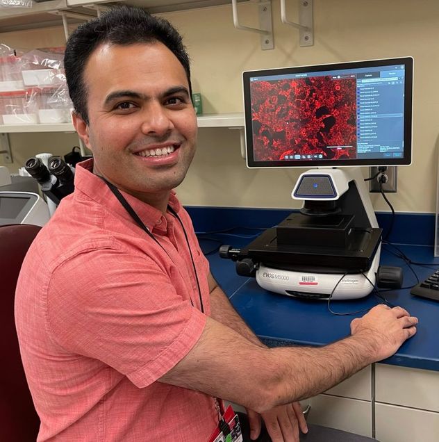 Mohsan Saeed at computer