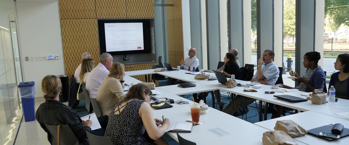 Group of people in a workshop meeting