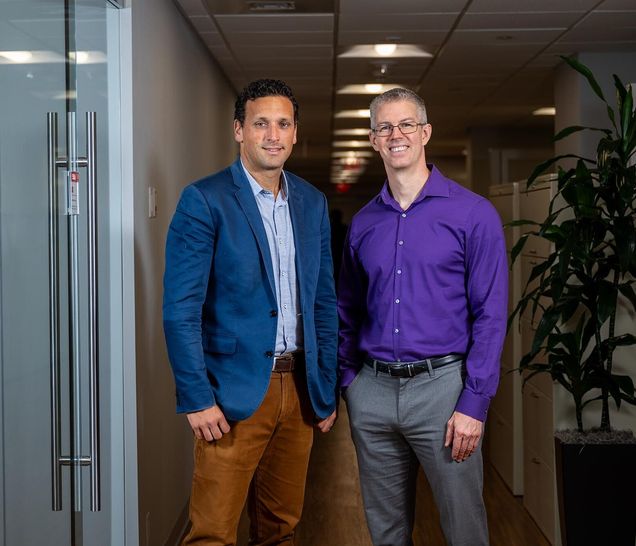 Two men posing for a photo