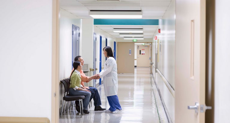 Doctor talking to patient