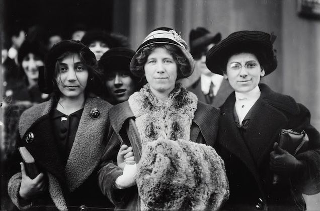 Three women in early twentieth century clothing