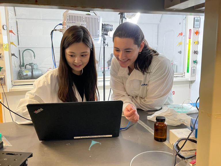 Members of BU Fluid Lab demonstrate the stability of soap bubbles using a high-speed camera.