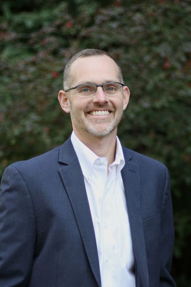 Headshot of Christopher J. Louis