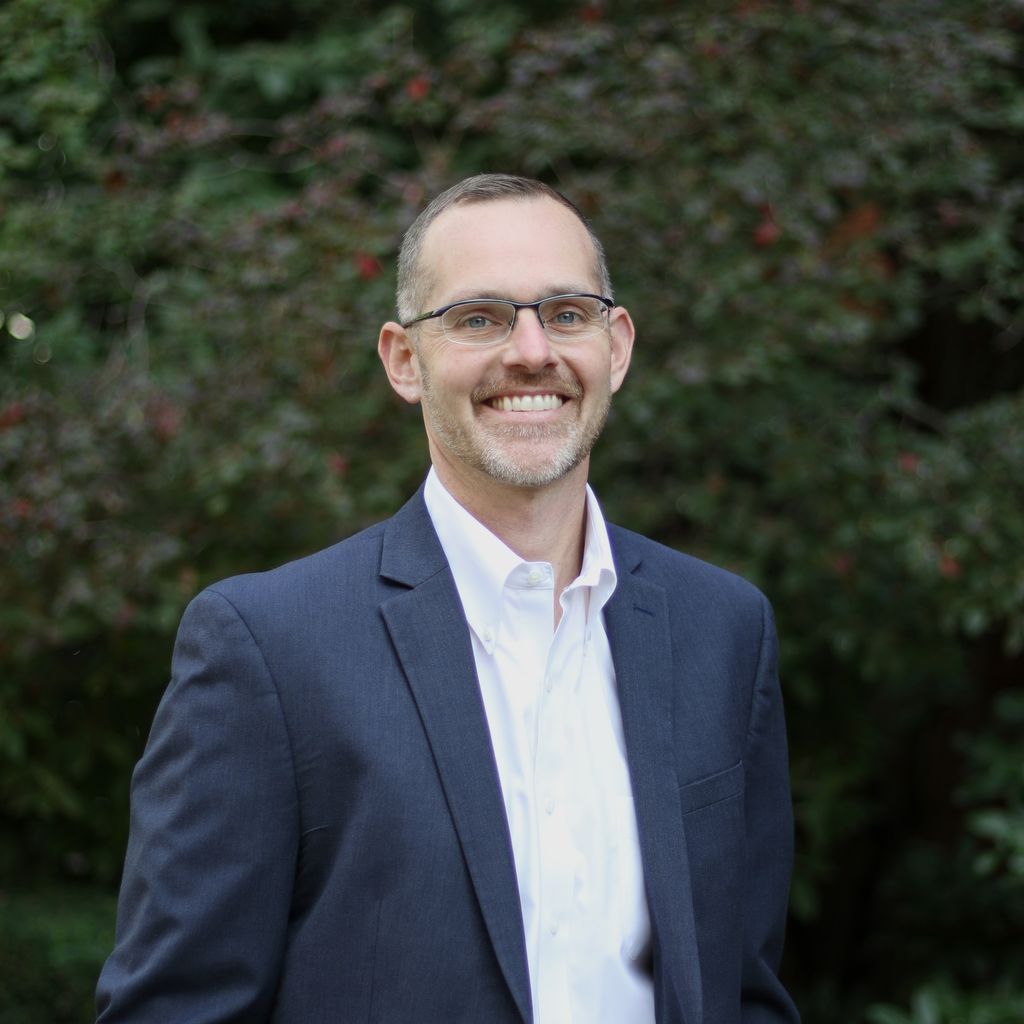 Headshot of Christopher J. Louis