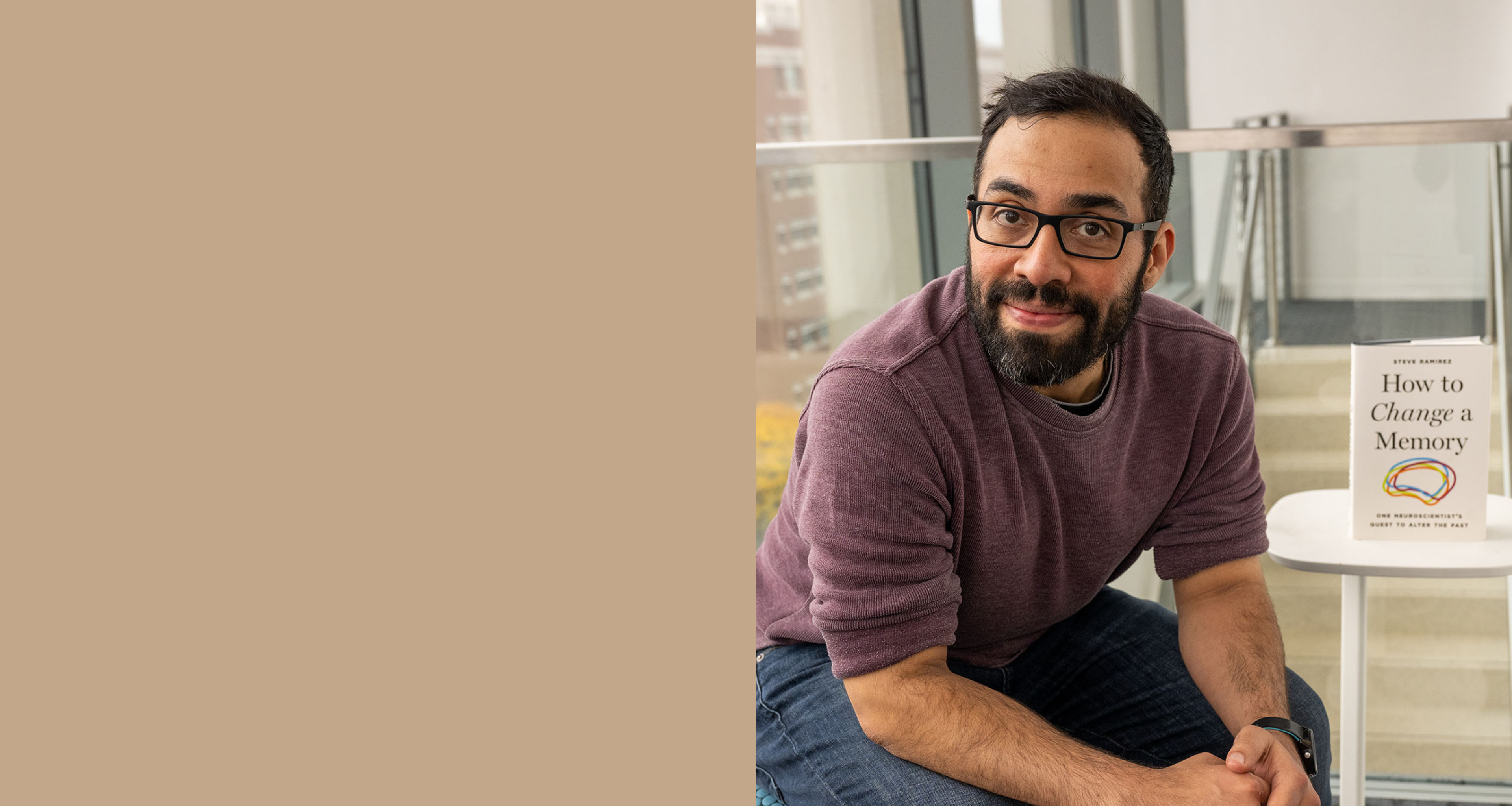 BU neuroscientist Steve Ramirez next to his book How to Change a Memory