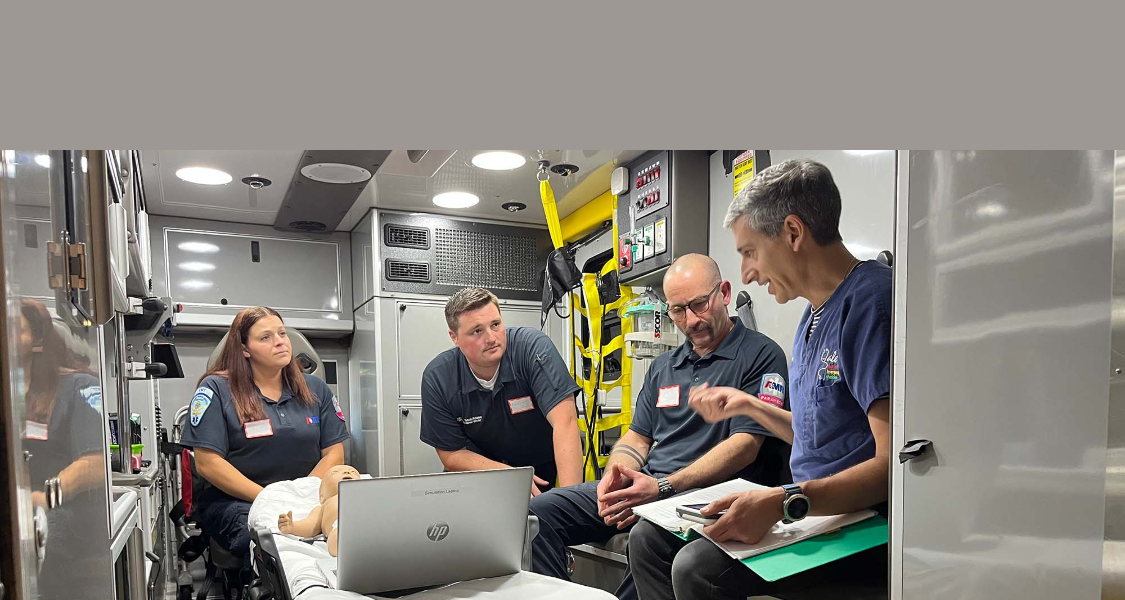 EMTs and BU researchers simulating an emergency in an ambulance