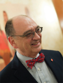 Benjamín Juárez in a blue suit and bow tie
