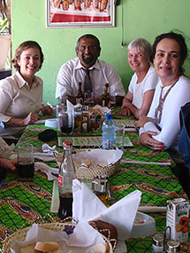 Marisa Mancini (’97) (left) and Wendy Coster (second from right) created a Brazilian version of an evaluation for children with disabilities.
