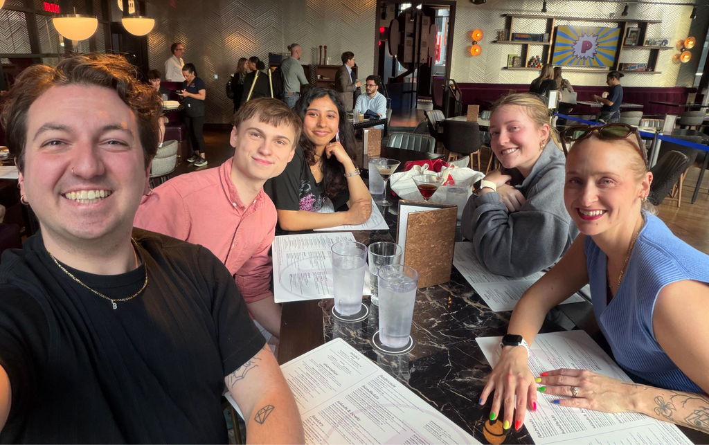 QUEER Lab photo of team at a meal