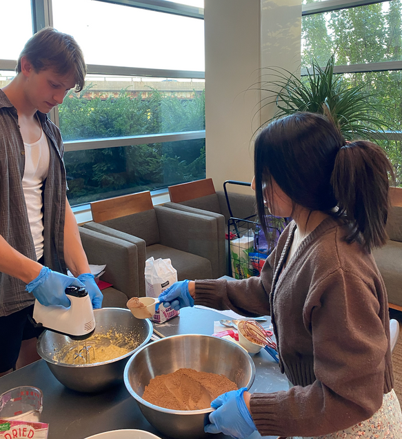 Students mixing cookie batter