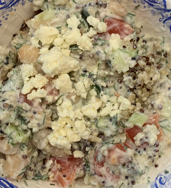To show the Mediterranean Bowl after the ingredients have been prepared and mixed.