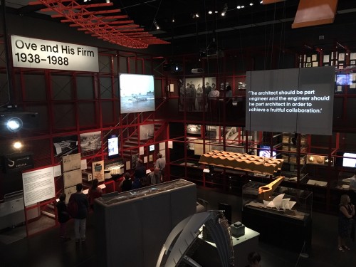 The exhibition’s dynamic multimedia display, comprising sound clips, video showing interview and architectural footage, projected text, drawings of components, models, photographs, and other archival materials. Photo courtesy of the author.