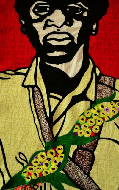 Figure 3. Detail of Figure 2: Zapatista women’s embroidery collective interpretation of Emory Douglas illustration, 2012. Embroidery.