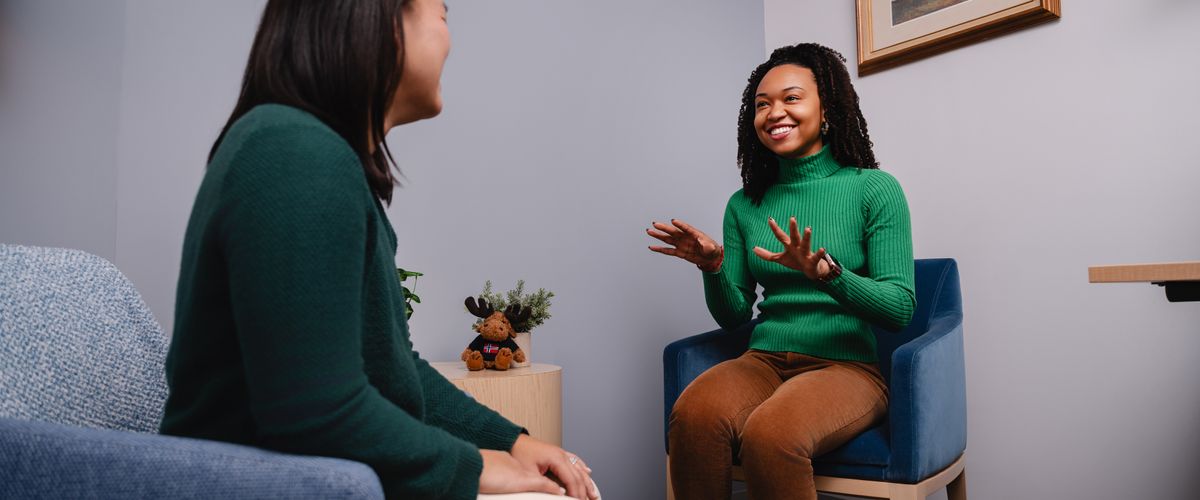 Counselor talking to a student