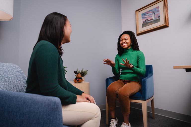 Counselor talking to a student