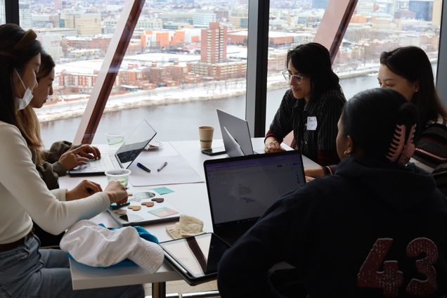 Students work during the Hackathon on Floor 17 of the BU Center for Computing & Data Sciences.