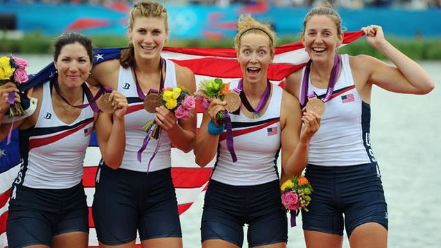 natalie dell and team with medals