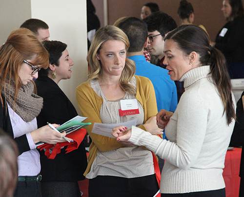 Nancy Brady, right, the Student Speaker at the 2013 BUSPH Commencement, returned to the School as a recruiter for John Snow, Inc. (JSI)