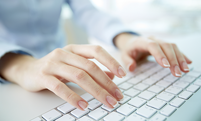 woman-works-on-keyboard