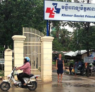 Haley Tupper in front of Khmer-Soviet Friendship Hospital in Phnom Penh, Cambodia.