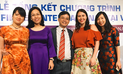 Lindsay White (second from right) with Bao Le Ngoc (middle) and colleagues at a celebration for Pathfinder International Vietnam.