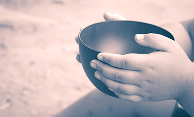 child-holding-bowl