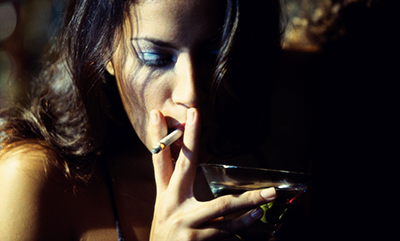 young-woman-smoking-drinking