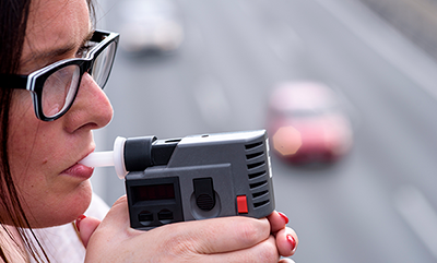 thumbnail-woman-taking-breathalyzer