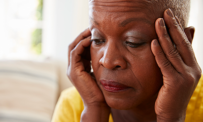 thumbnail-senior-woman-holding-head