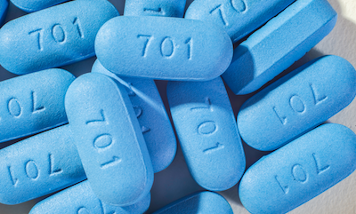 Pre-exposure prophylaxis (PrEP) pills: oblong blue pills stamped with "701"