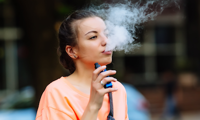 Teen girl vaping