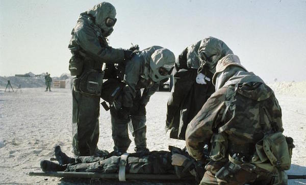 United States troops wearing NBC [Nuclear Biological and Chemical] outfits in Kuwait in 1991