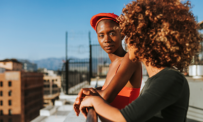 loving-concerned-lesbian-couple-on-rooftop-400x241